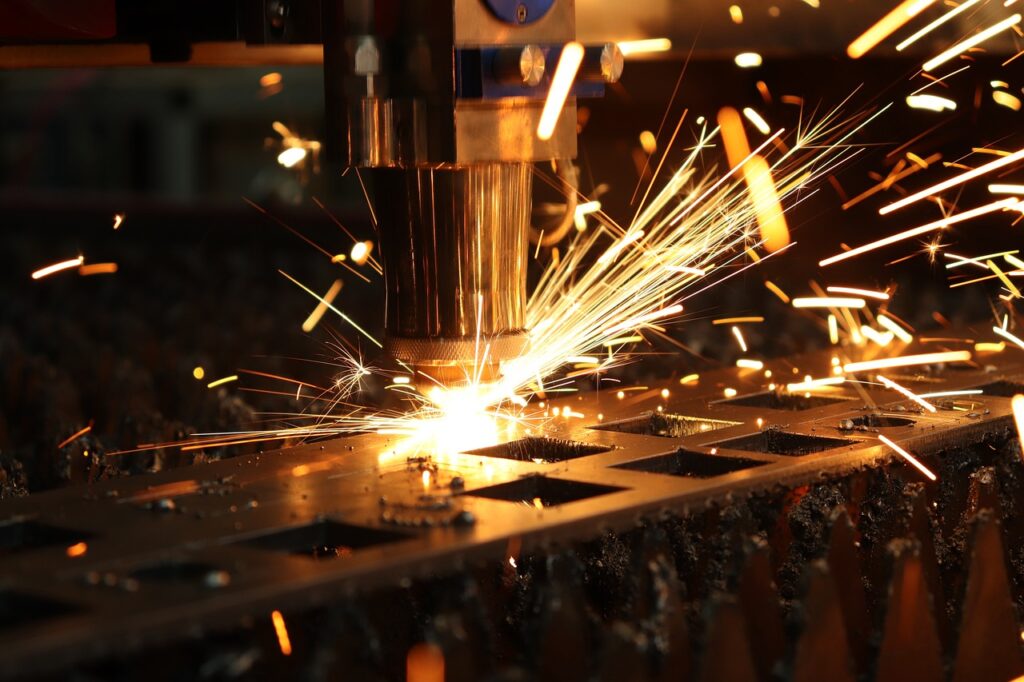 the laser cuts, sparks, production
